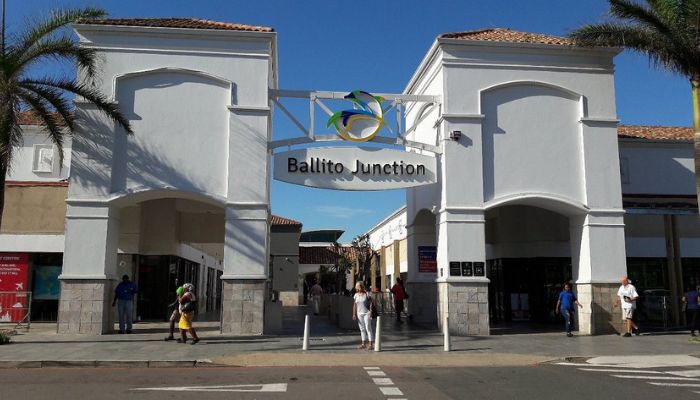 Image of Ballito Junction Regional Mall: A modern and spacious shopping center bustling with shoppers, vibrant storefronts, and a lively ambiance