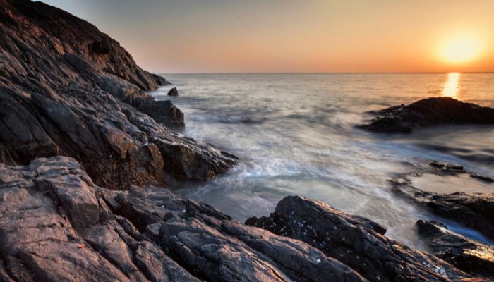 Gokarna Cliff, a stunning natural formation overlooking the sea in Karnataka, offering panoramic views of the coastline and tranquil waters