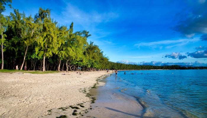 Mont Choisy Beach in Mauritius, a picturesque wonder near the airport, featuring white sands and turquoise waters