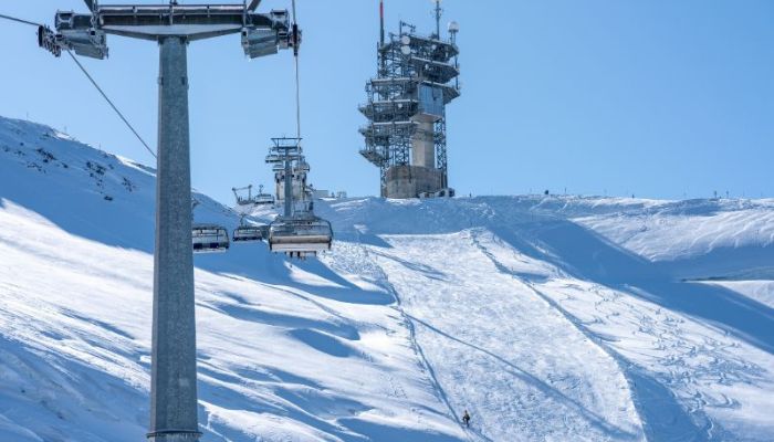 Aerial thrill: Cable car ride adventures in Engelberg, Switzerland, providing a breathtaking journey with panoramic views of the alpine landscape