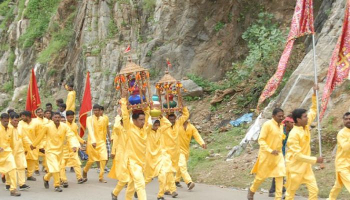 Devotees at the Bhadrapad Ambaji Fair with colorful decorations and vibrant festivities