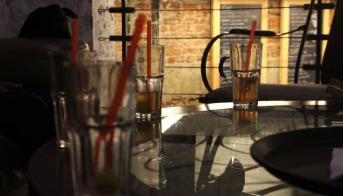 A couple enjoying their coffee at a cozy table in Soul Brew Coffee, Vadiwadi, Vadodara.